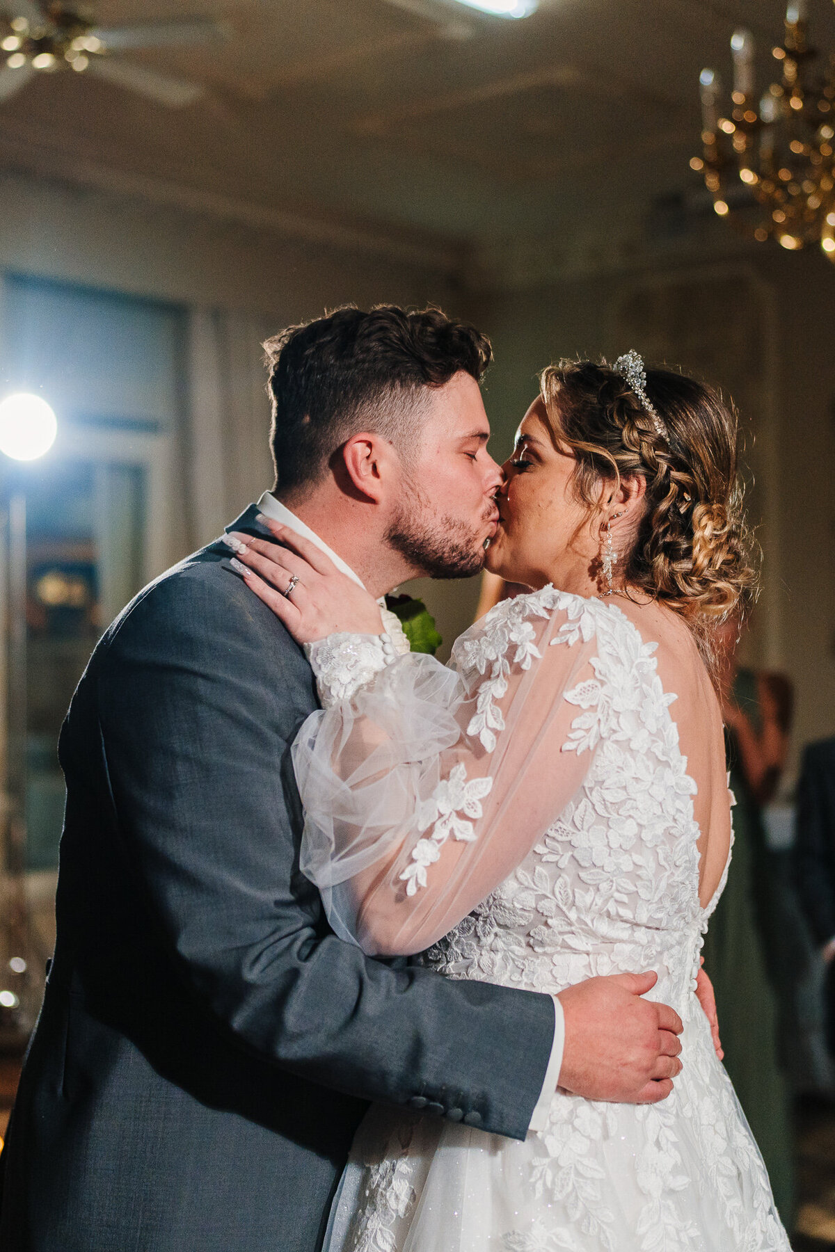 Bride and Groom kissing during first dance at Merewood Country House Hotel  taken by Wedding Photographer Anthony Horseman