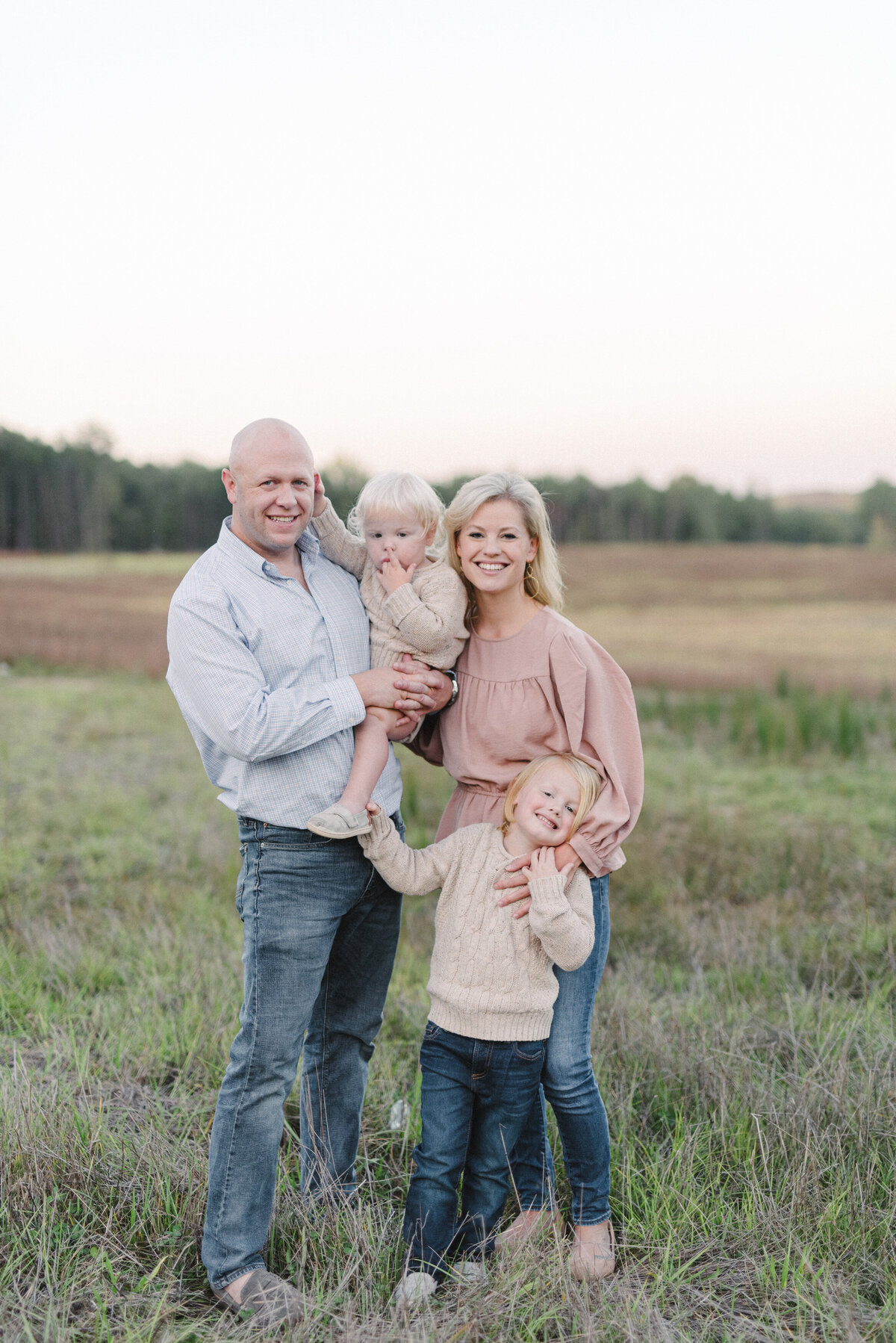 Family portraits in Hoover, AL at Moss Rock Preserve in a field