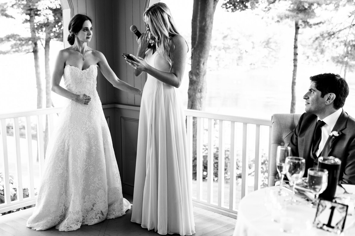 Bride and her sister tear up at the toast at York Golf and Tennis Club Maine
