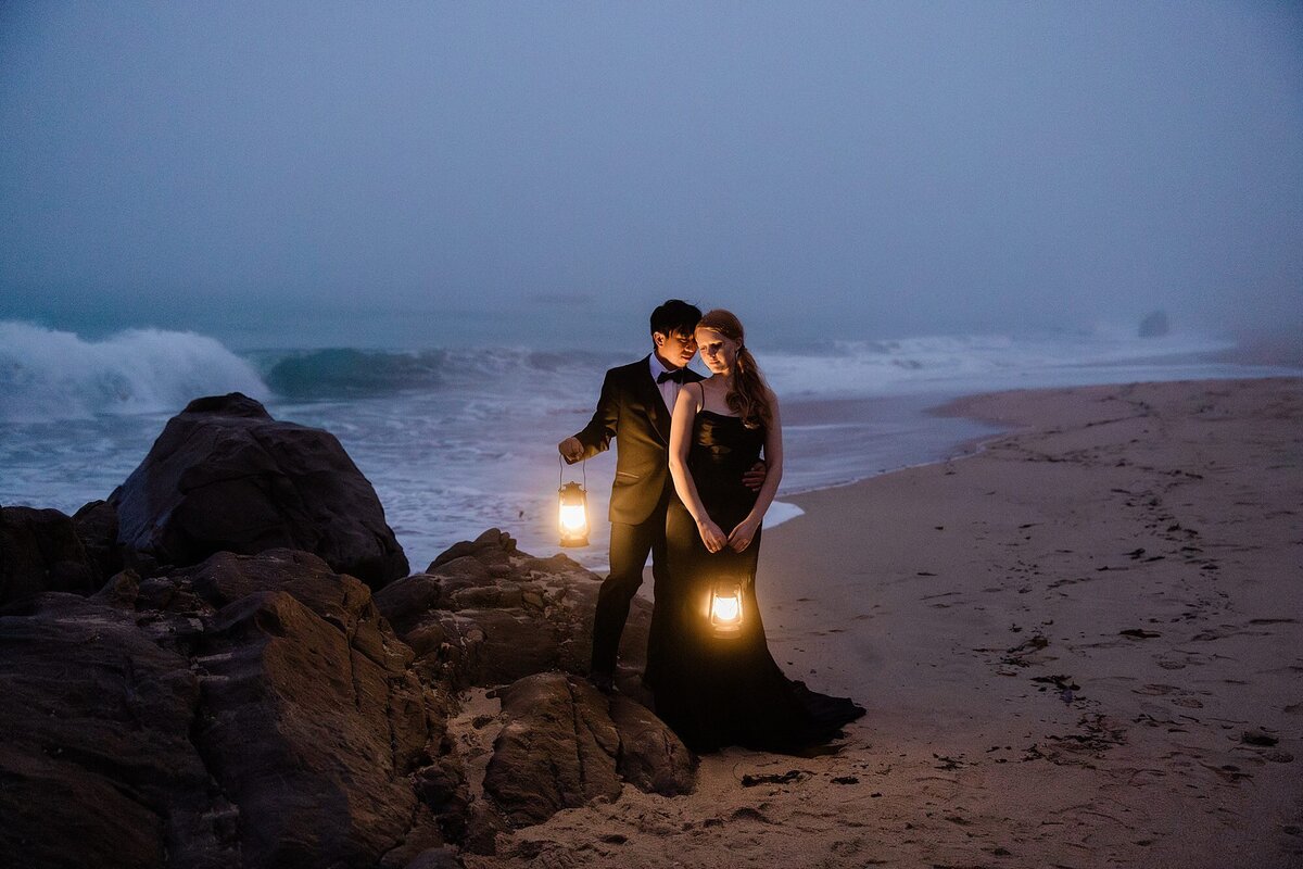 The bride wears a black wedding dress to her elopement in Big Sur.