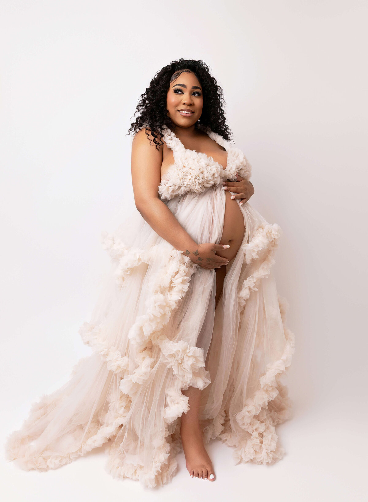 Best maternity photographer Brooklyn NY elegant mom to be in ivory dress 