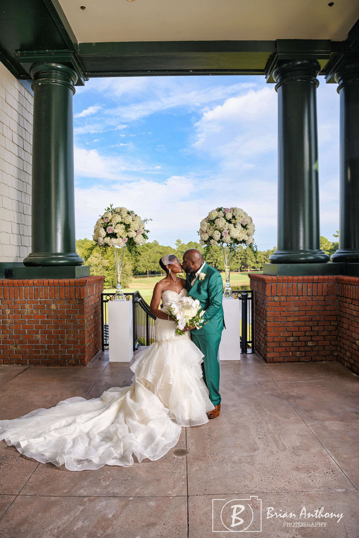 Newlyweds joyfully walking down the aisle after exchanging vows at their wedding ceremony.