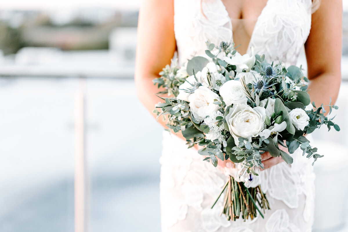 simple white and green floral bouquet at the cedar room