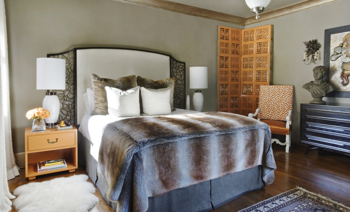 Panageries Residential Interior Design | Tudor Revival Estate Guest Bedroom with Luxurious Furs and pops of Orange