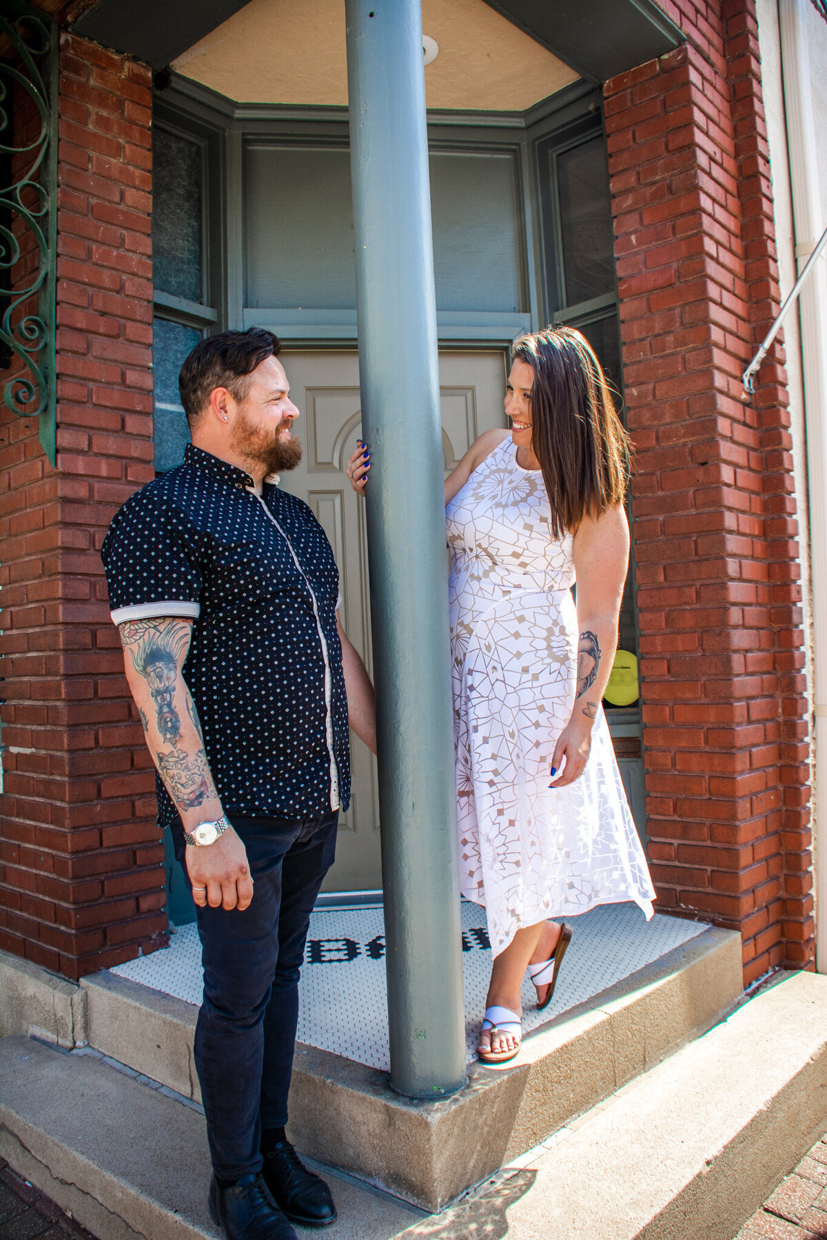 engaged couple stand together in downtown phoenix