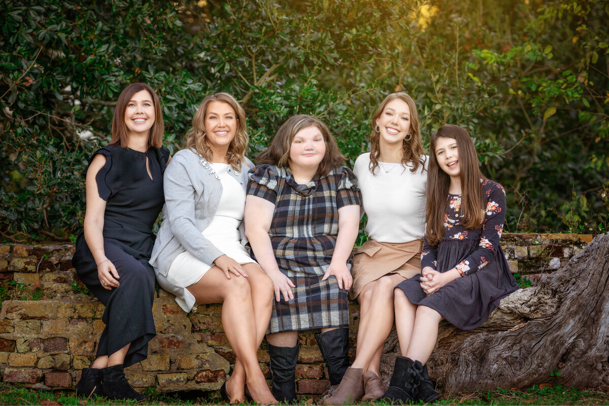 extended family Spanish Fort New Orleans brick wall women down syndrome girl