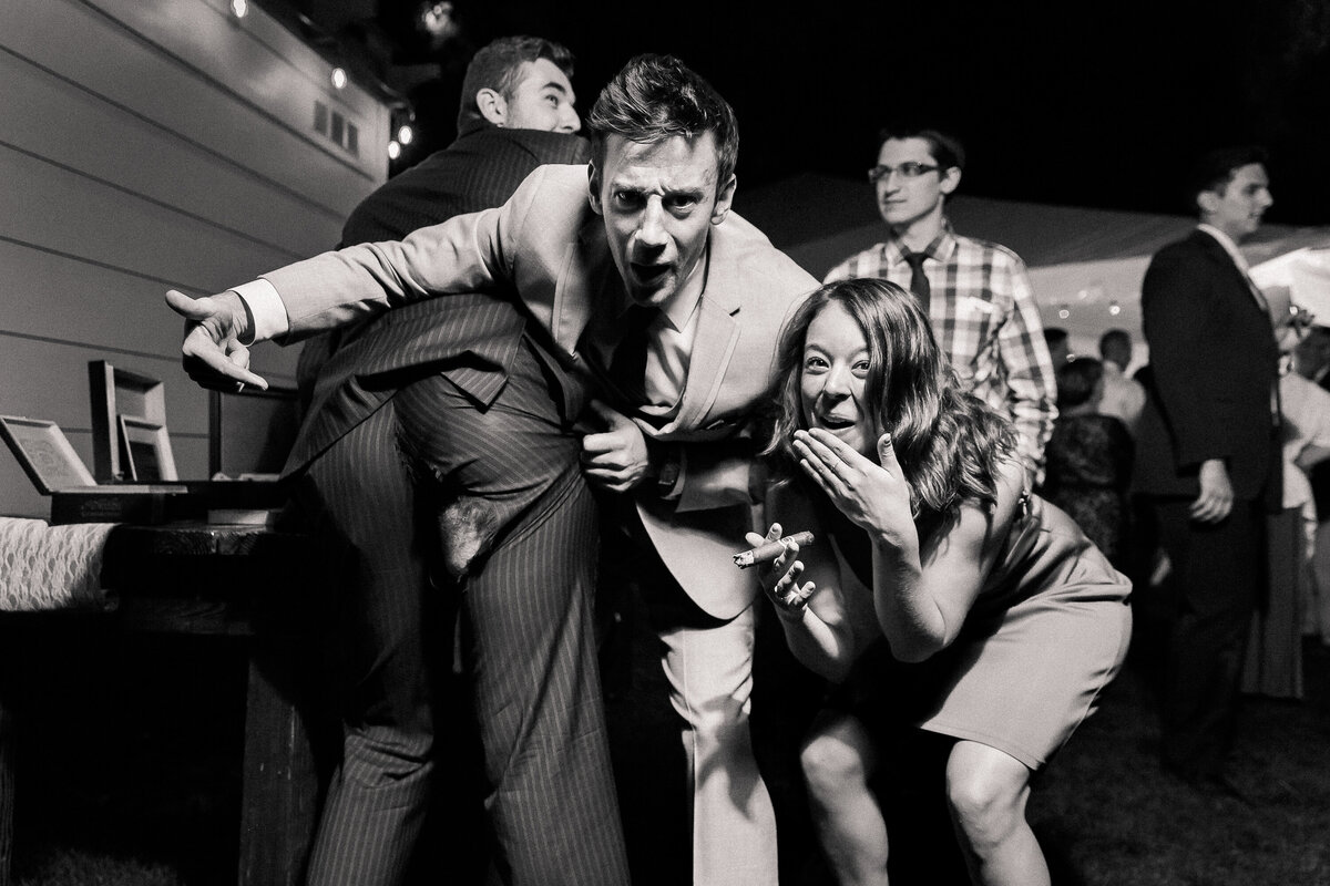 Wedding guests make fun of their friend's unfortunate situation where he ripped his pants on the dance floor during the reception in Spokane, Washington.