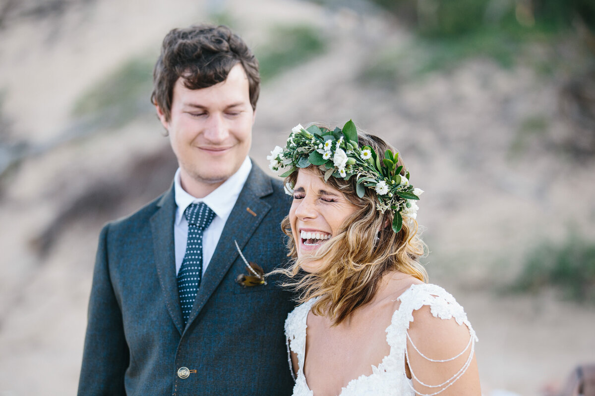 Bride laughing spontaneously, photographed by Bendigo Portrait photographer.