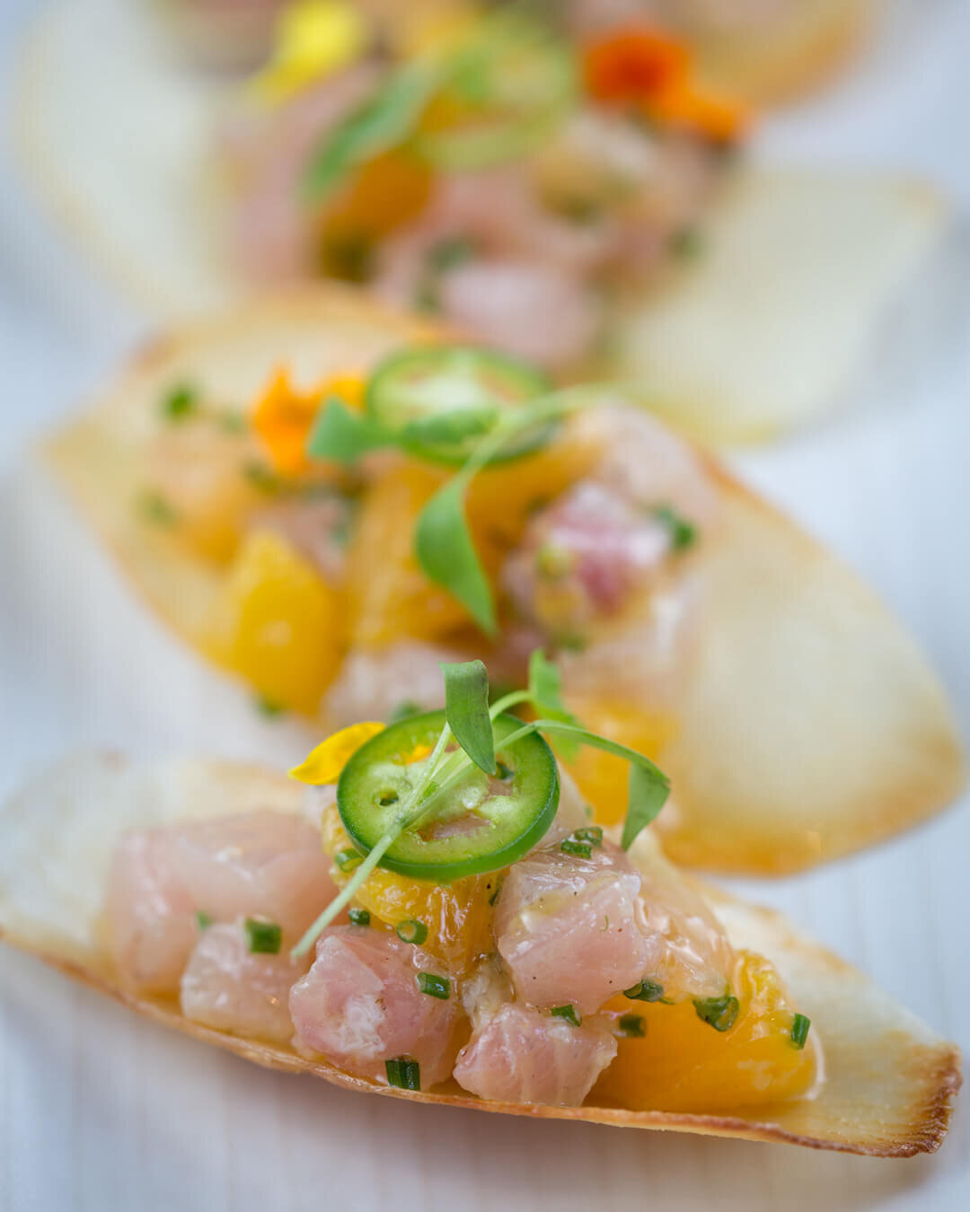 Hamachi nacho bites on yucca chips from Uncorked