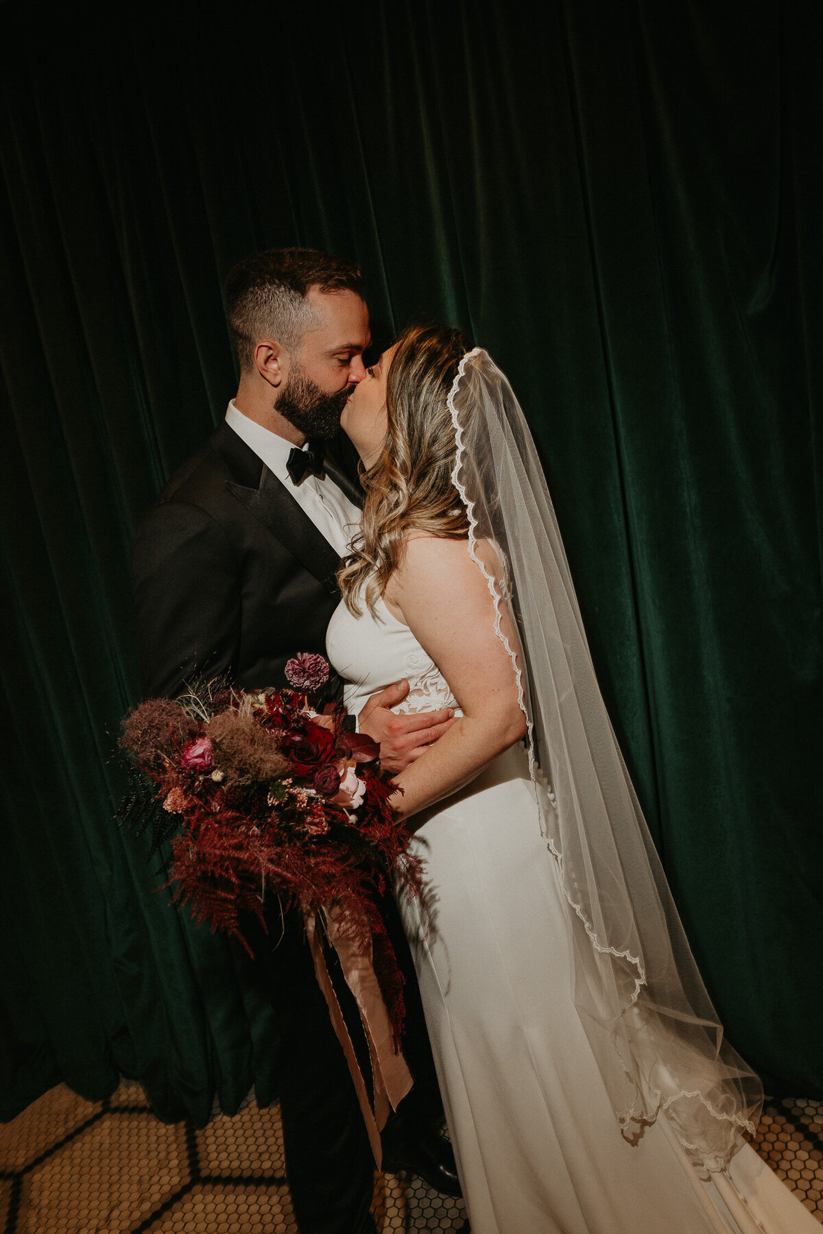 Bride and groom in the bar at Grand Hotel in Birmingham on their wedding day. 