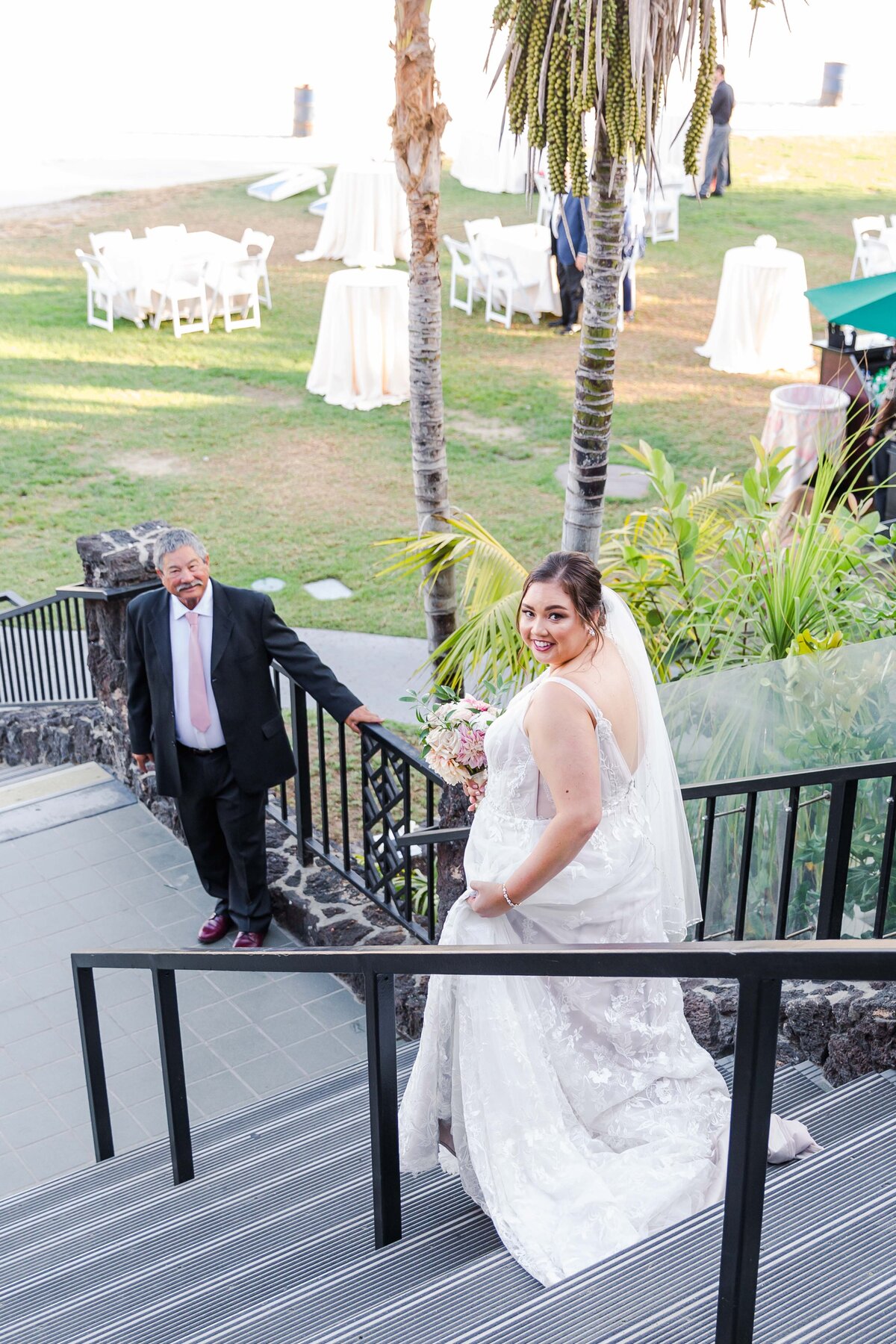 bride-and-father-walking-down-stairs-the-catamaran