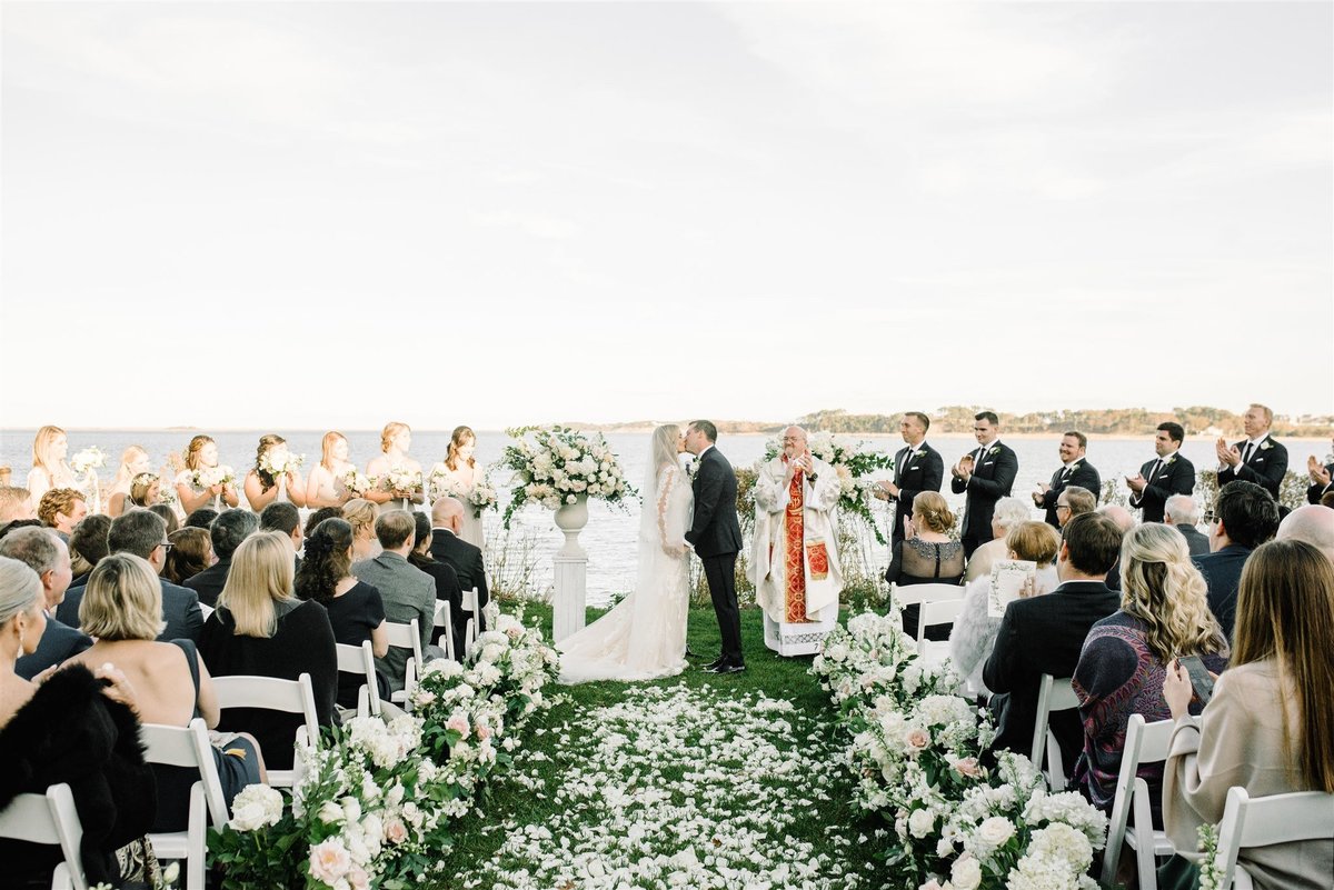rose petal aisle for coastal ceremony for a Cape Cod Wedding by luxury Cape Cod wedding planner and designer Always Yours Events