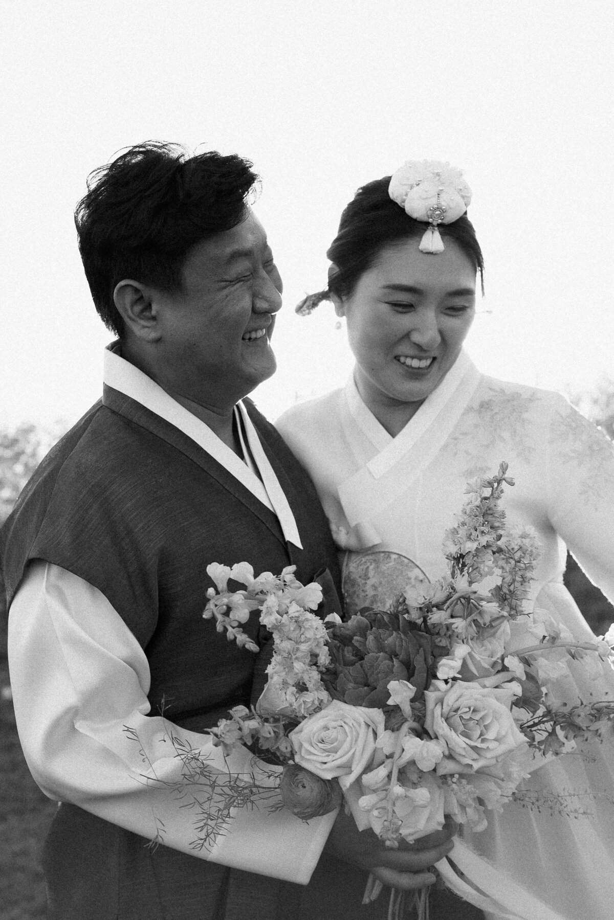 happy asian bride and groom