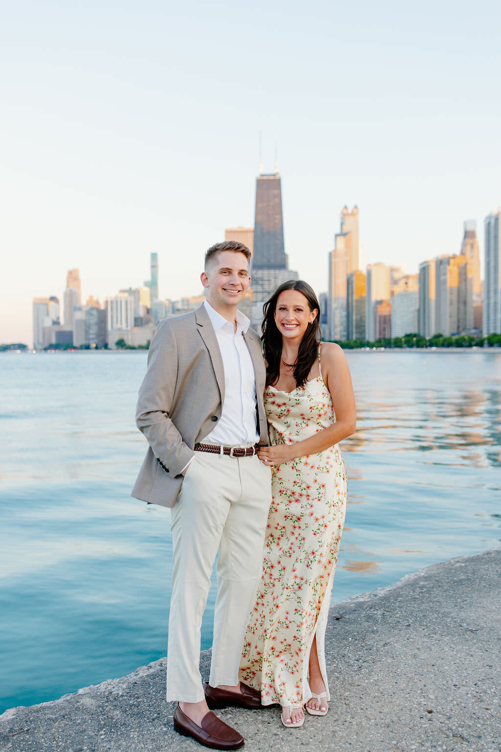 An engagement photography session at The Wrigley Building and North Ave Beach in Chicago, Illinois - 15