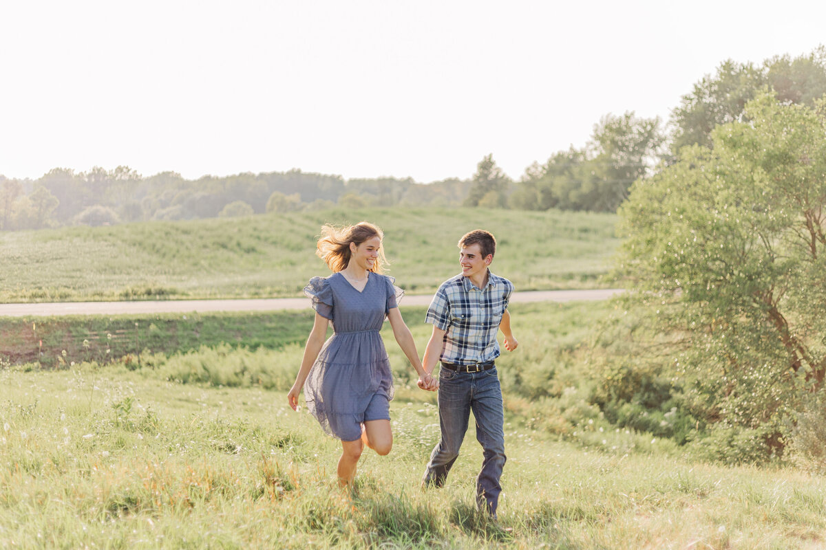 couple running in a field