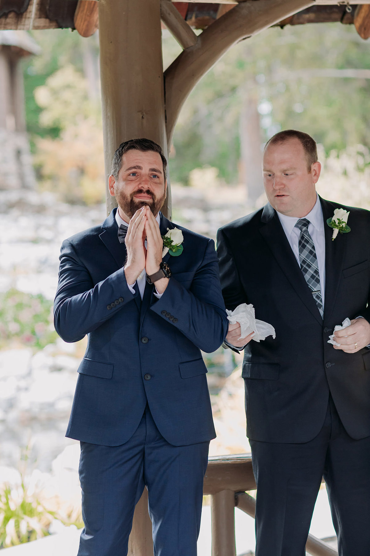 groom crying reaction to seeing bride banff cascade gardens wedding ceremony
