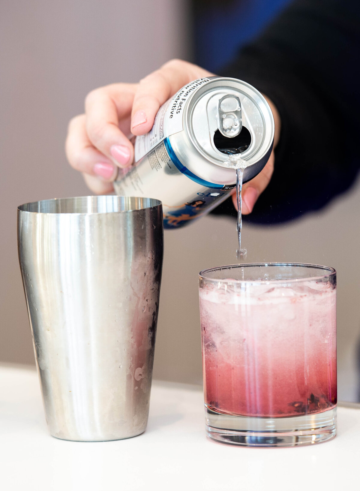 bartenders preparing signature drinks at the eQ Groundbreaking event.  Captured by Ottawa Event Photographer JEMMAN Photography COMMERCIAL