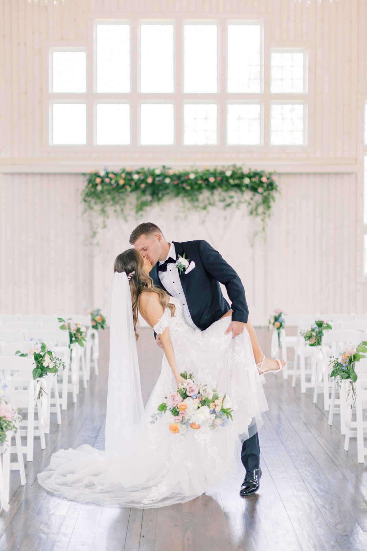 Couple in the aisle at Rosewood Farms wedding, PA.