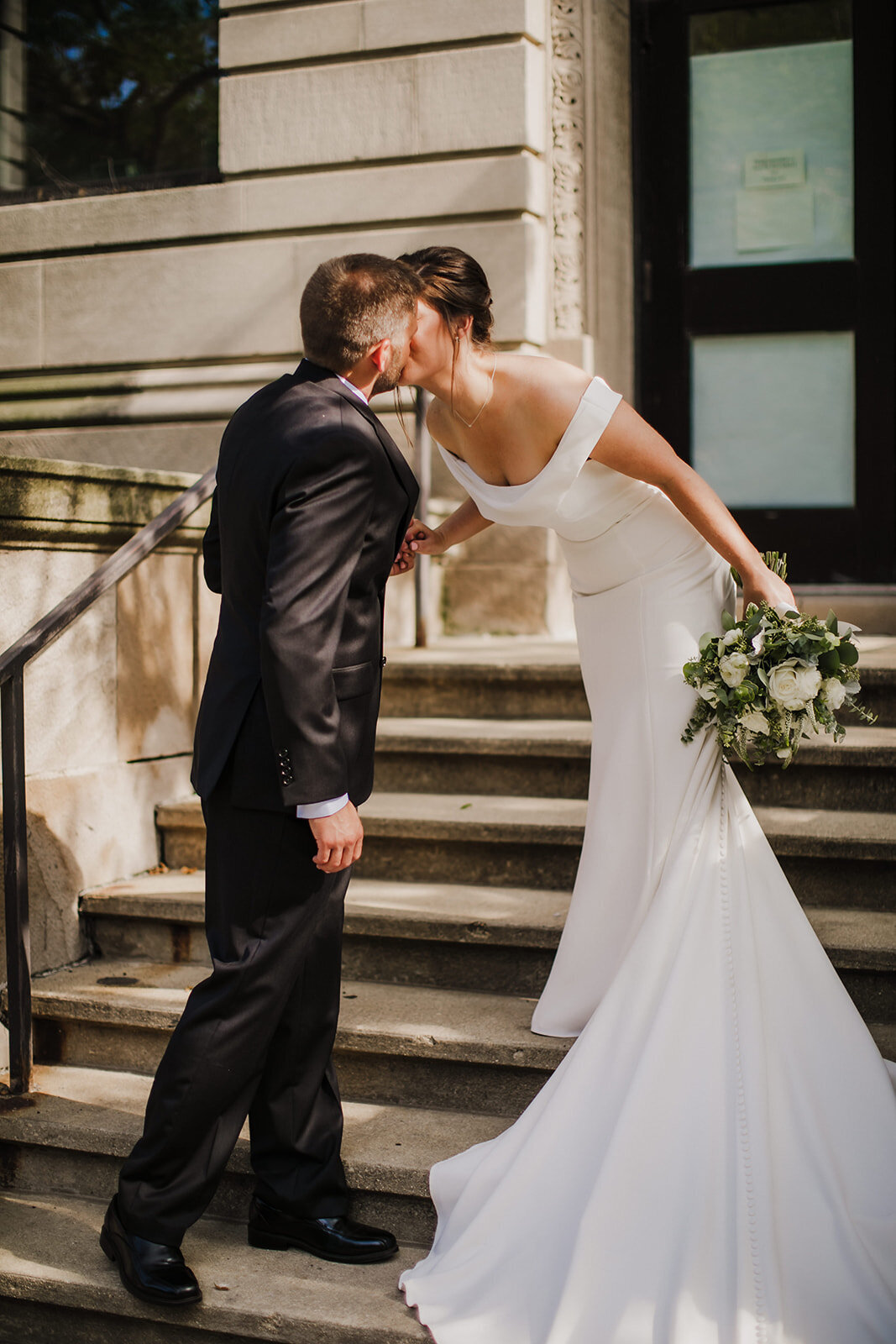 Bride and groom kiss during Chicago elopement
