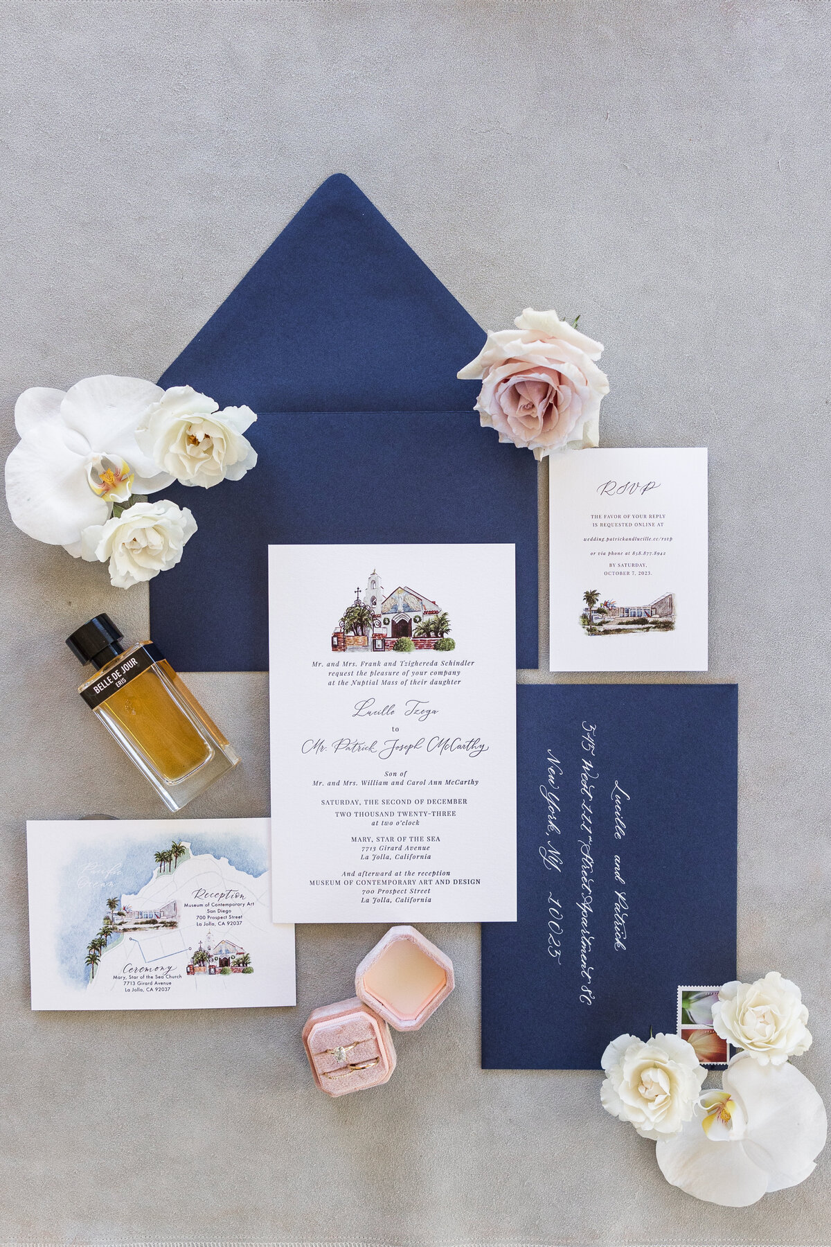 blue-and-cream-wedding-invitation-flat-lay