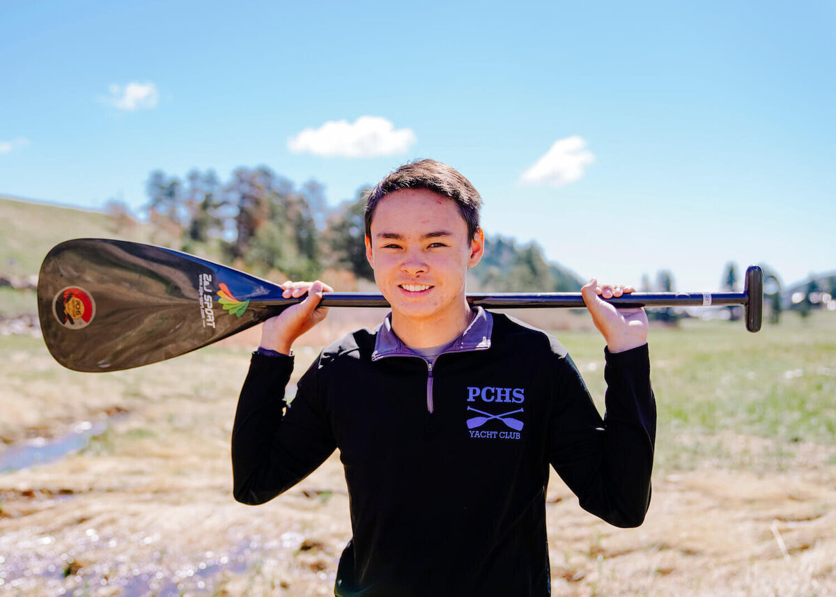 denver photographers senior pictures - boy holding paddle