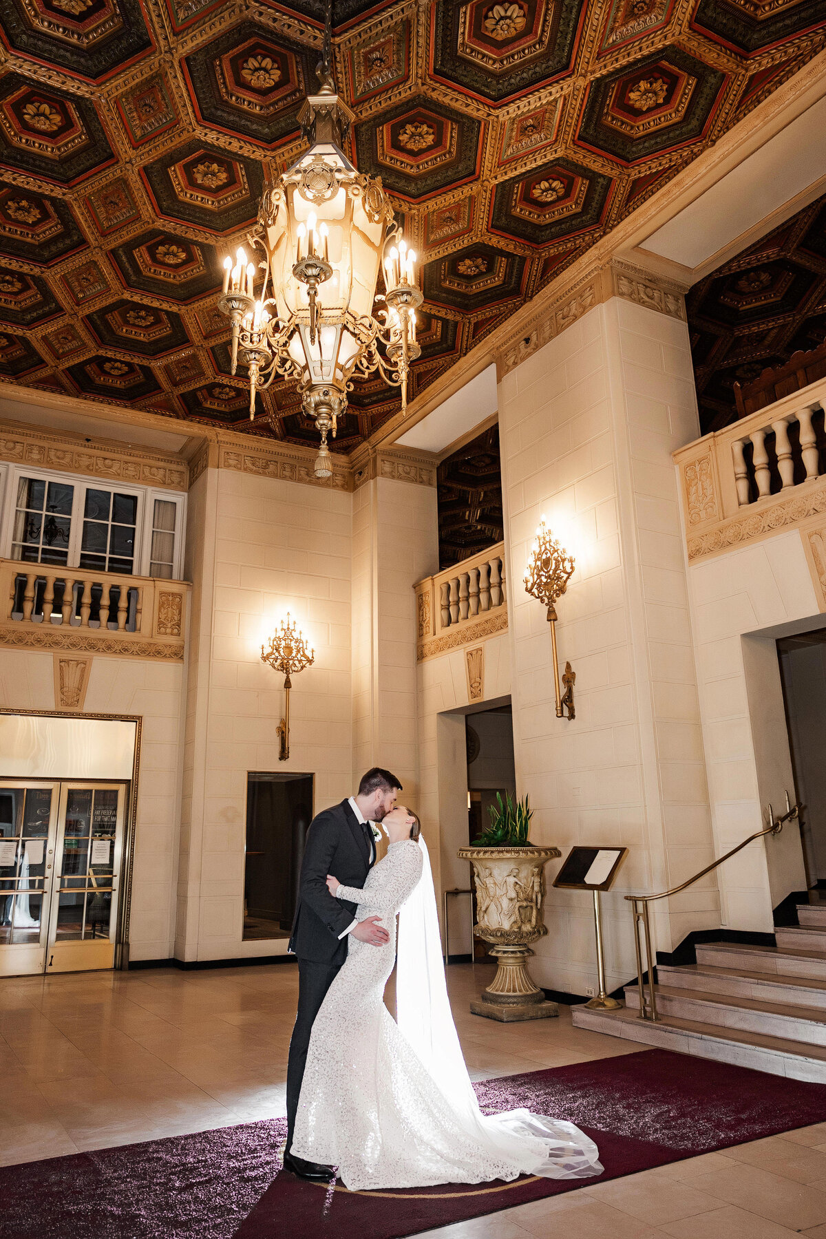 wedding photos in the lobby of the omni william penn hotel