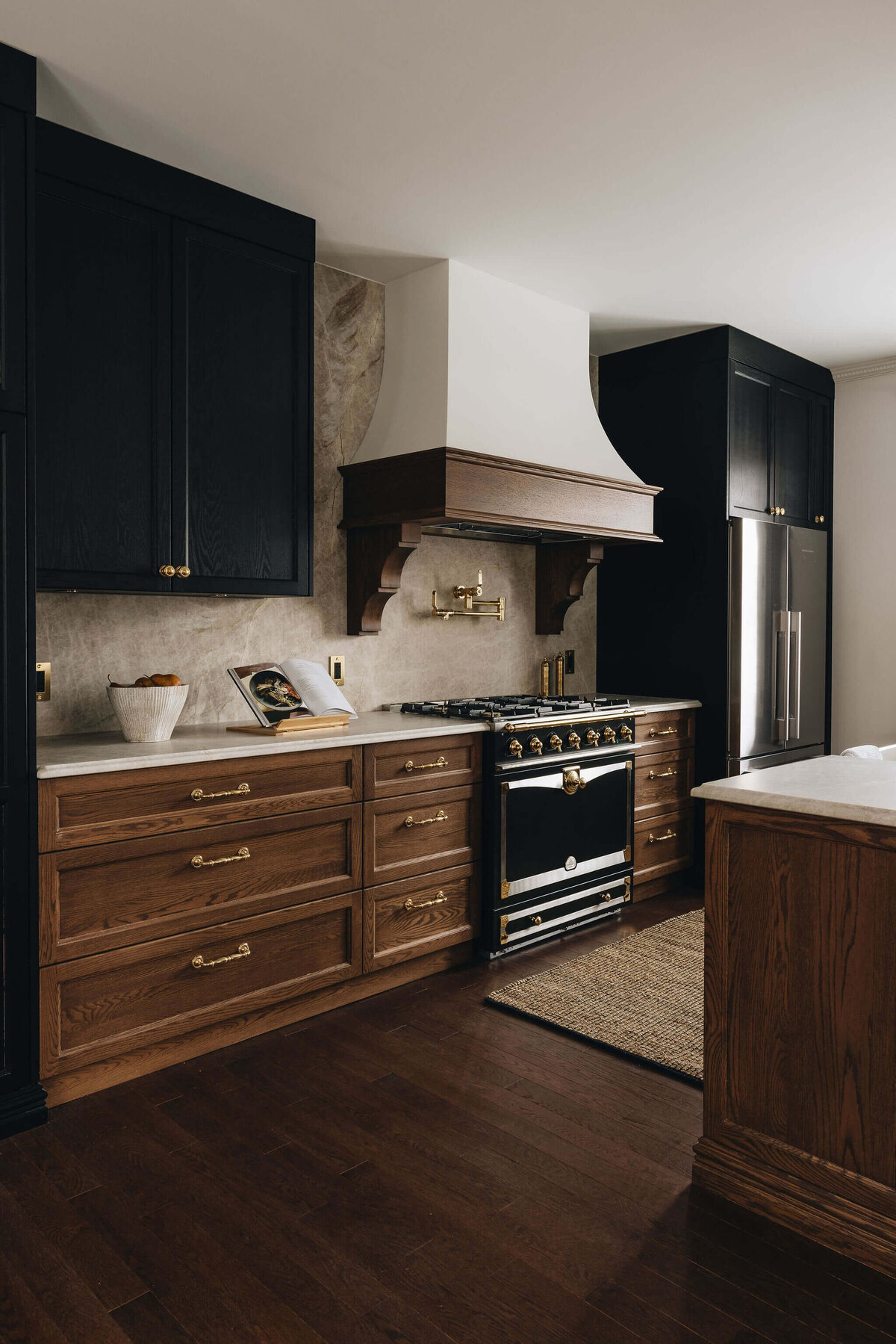 Open concept kitchen redesign in Montreal, with high-end gas range