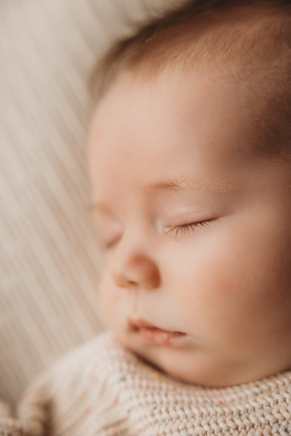 detail of eyelashes of newborn baby captured by Bie in wanaka