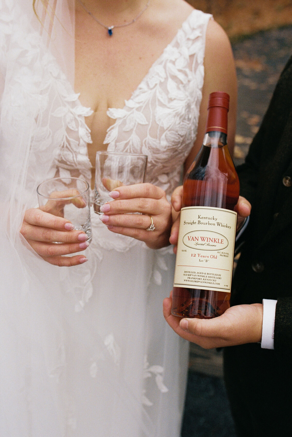 brides holding special bottle