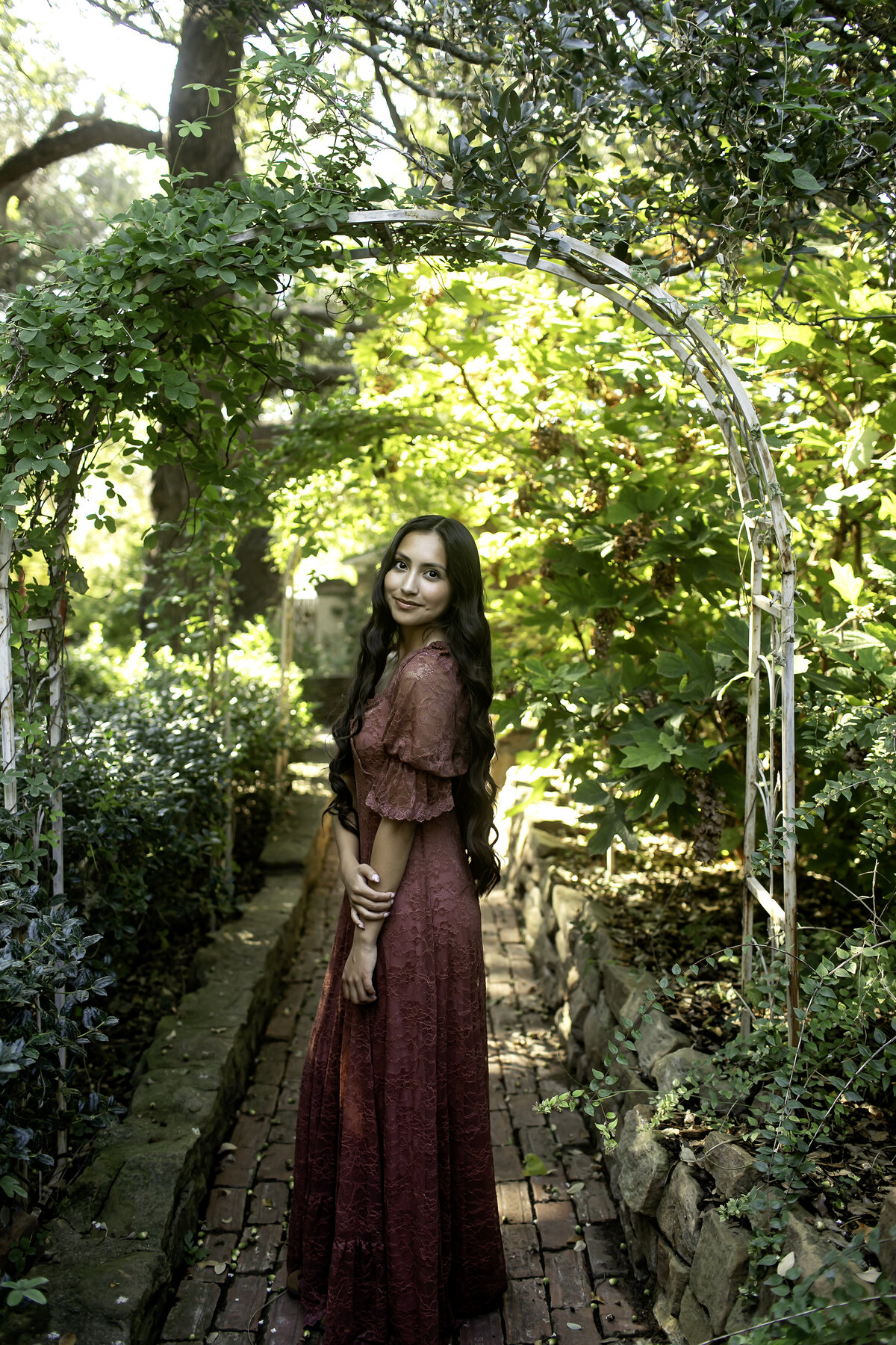 Celebrating senior year in the lush beauty of Chandor Gardens, Weatherford, TX, with a high school senior capturing both their personality and the garden’s natural elegance