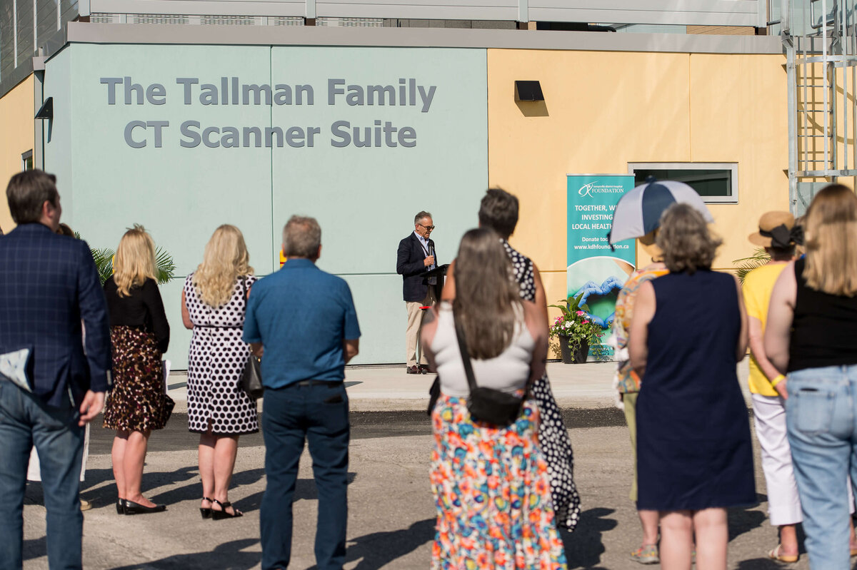Ottawa event photography showing attendees listening to speeches during the KDH CT Suite Grand opening.  Captured by JEMMAN Photography COMMERCIAL