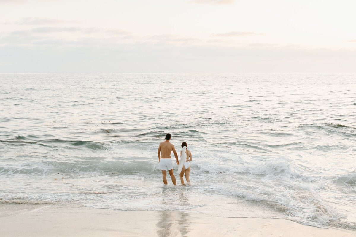 couple standing on the beach