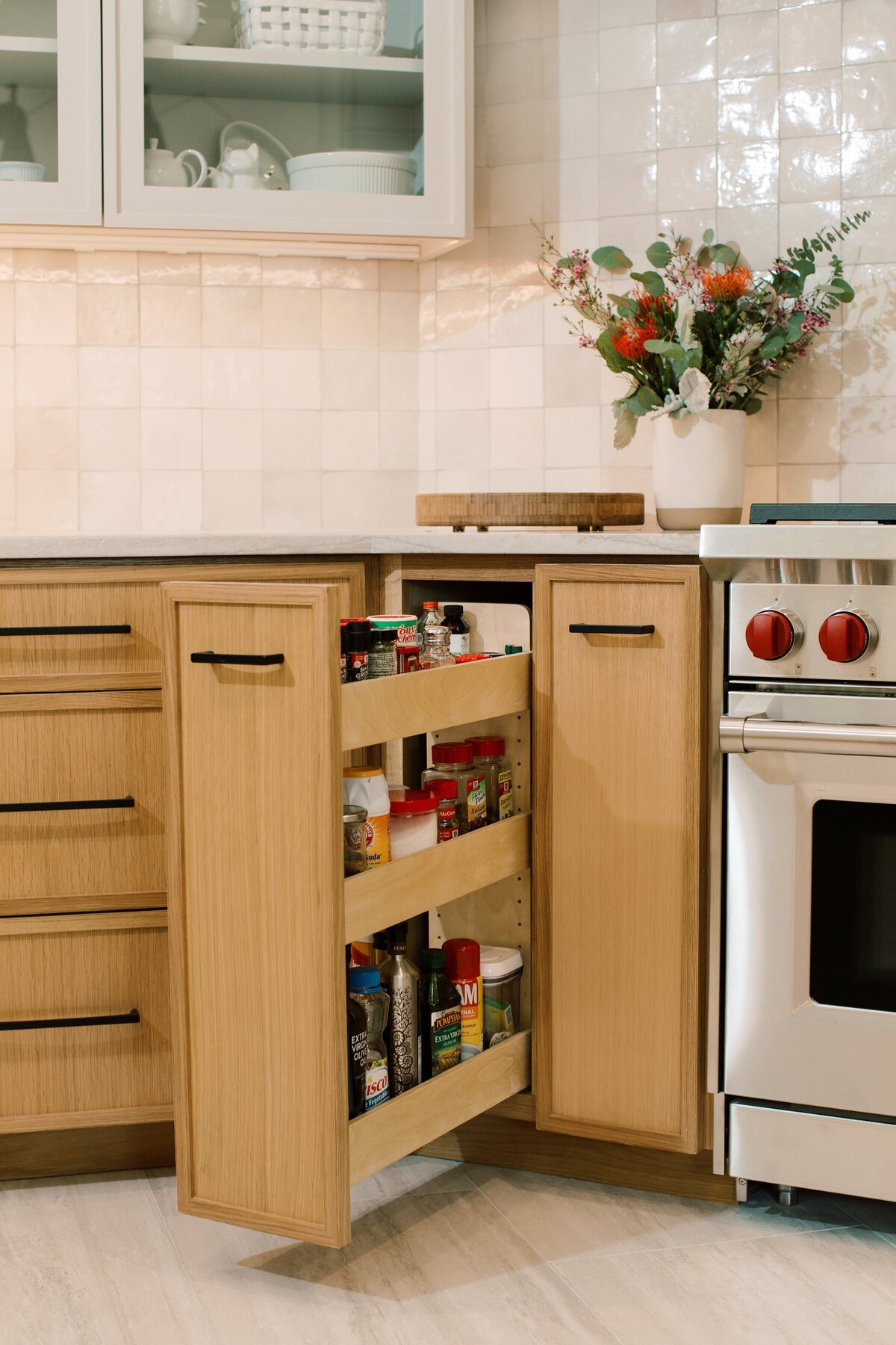 hello-home-modern-kitchen-remodel-natural-wood-cabinets-spice-pull-out-zellige-backsplash-wolf-range-austin-62