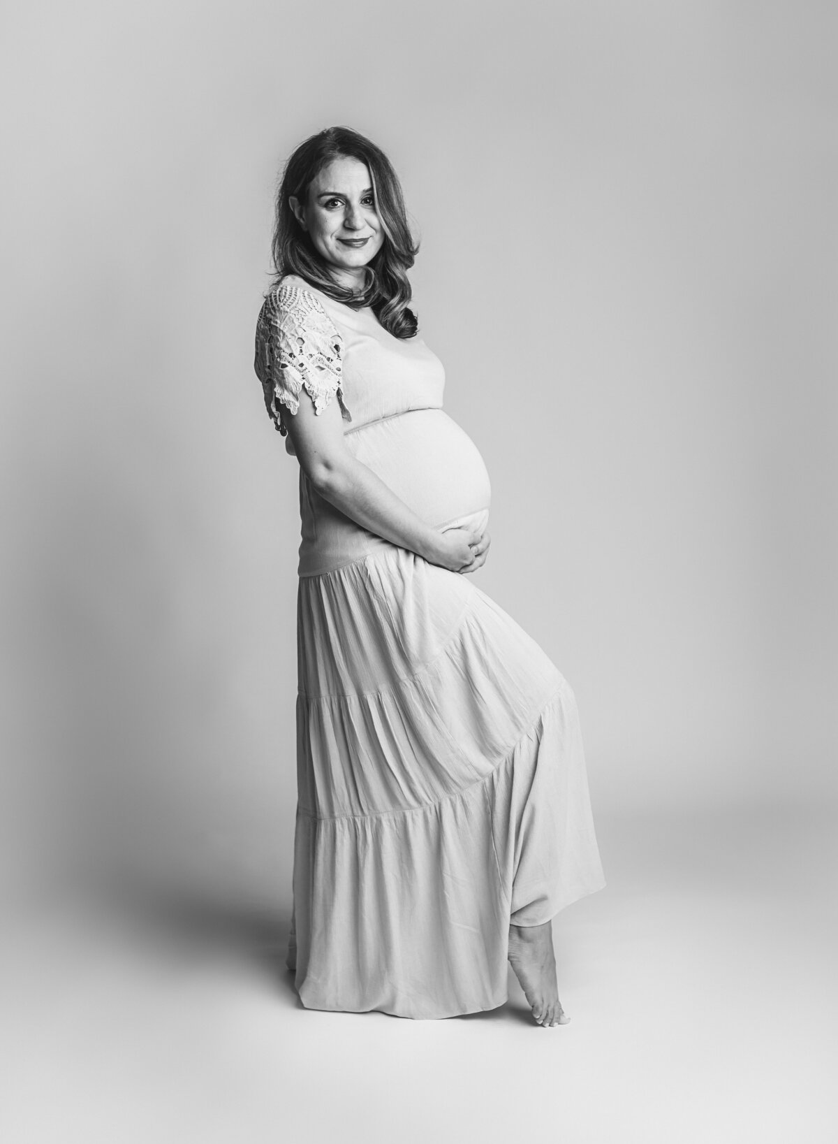 Capture the elegance of your pregnancy with black and white maternity portraits by Leslie Q Photography. Timeless, high-quality images that celebrate this special moment. Serving New Carlisle, South Bend, LaPorte, Michigan City, and surrounding areas.