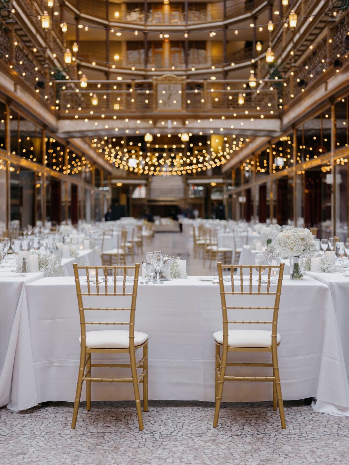 Chic reception table with acrylic accents at The Arcade wedding
