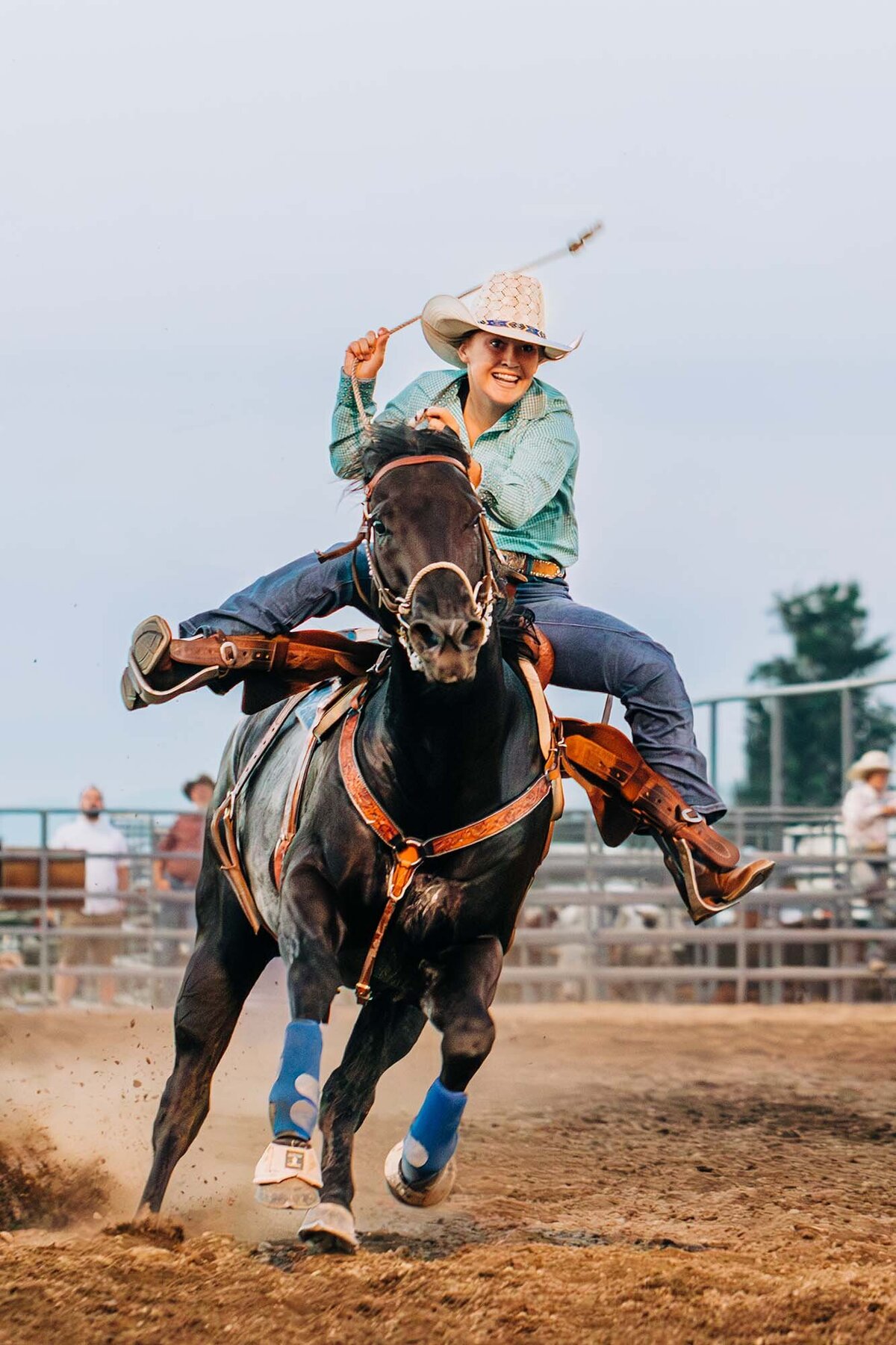 Rodeo photo of female barrel racer at Montana rodeo