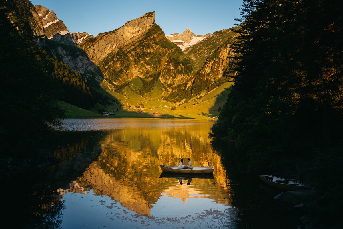 Taking the rowboat at sunrise on the lake in Appenzell
