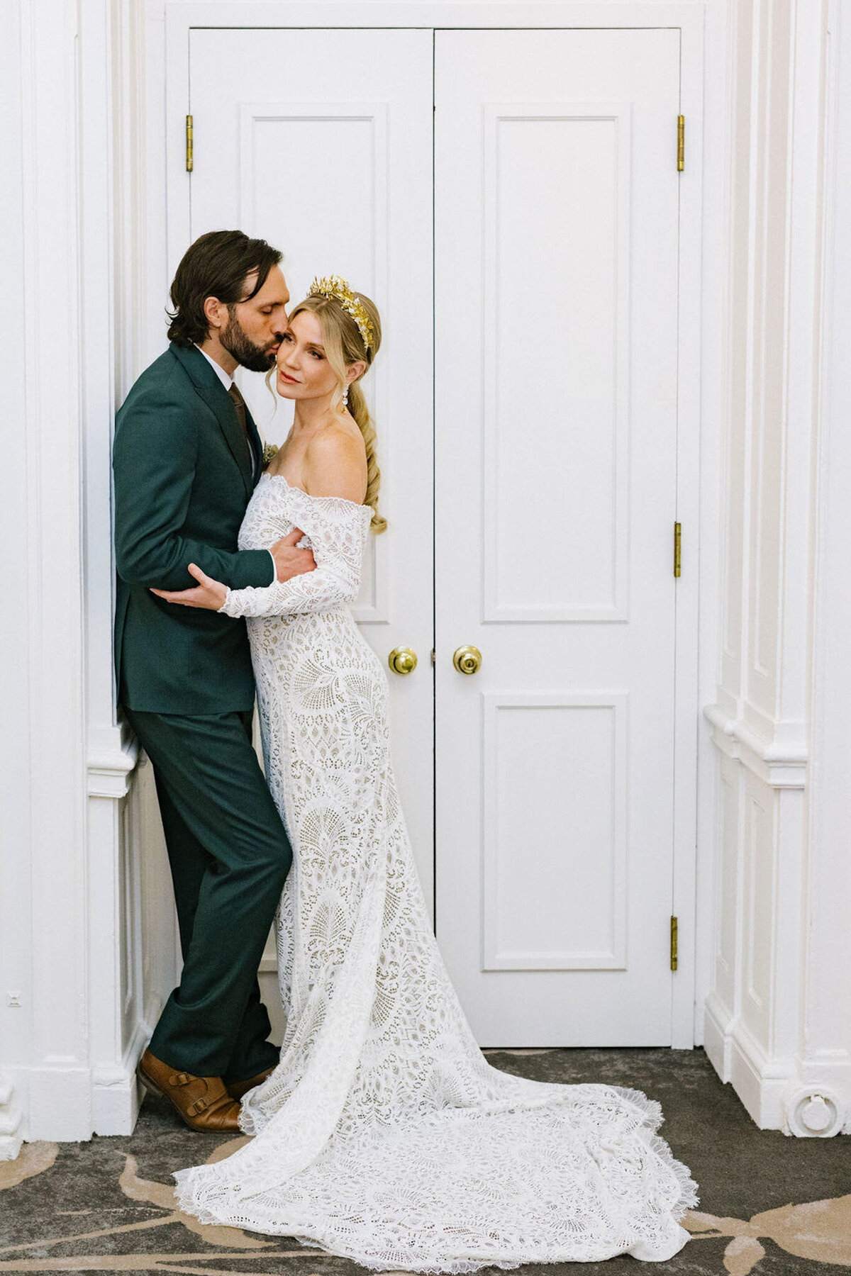 Couple embracing at Fairmont Palliser Hotel