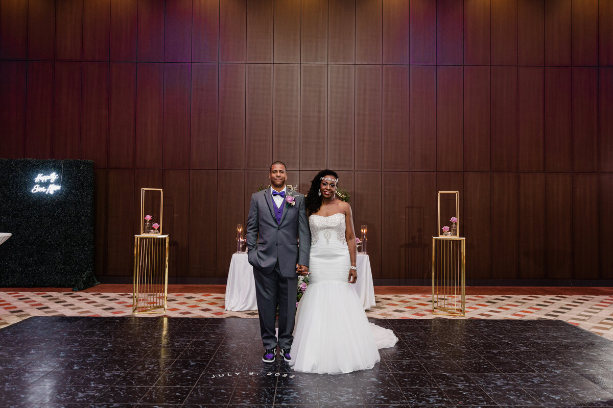 bride and groom standing together