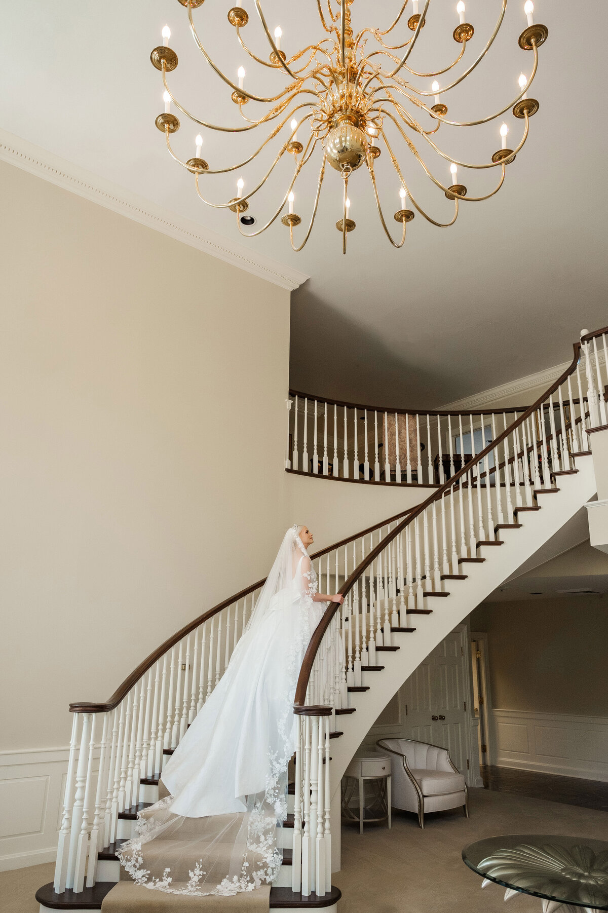 bride on the staircase at The Grand Resort wedding picture