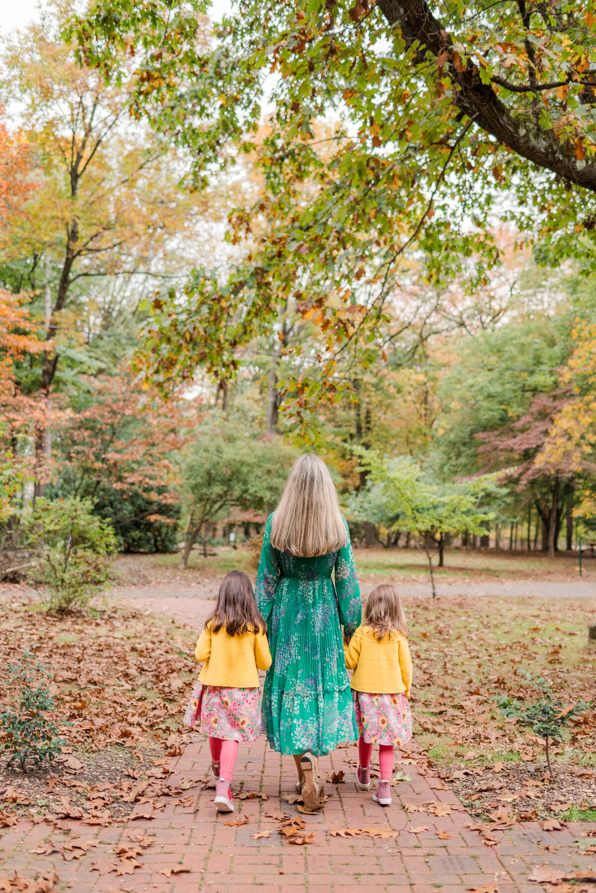 Mom and daughters walking