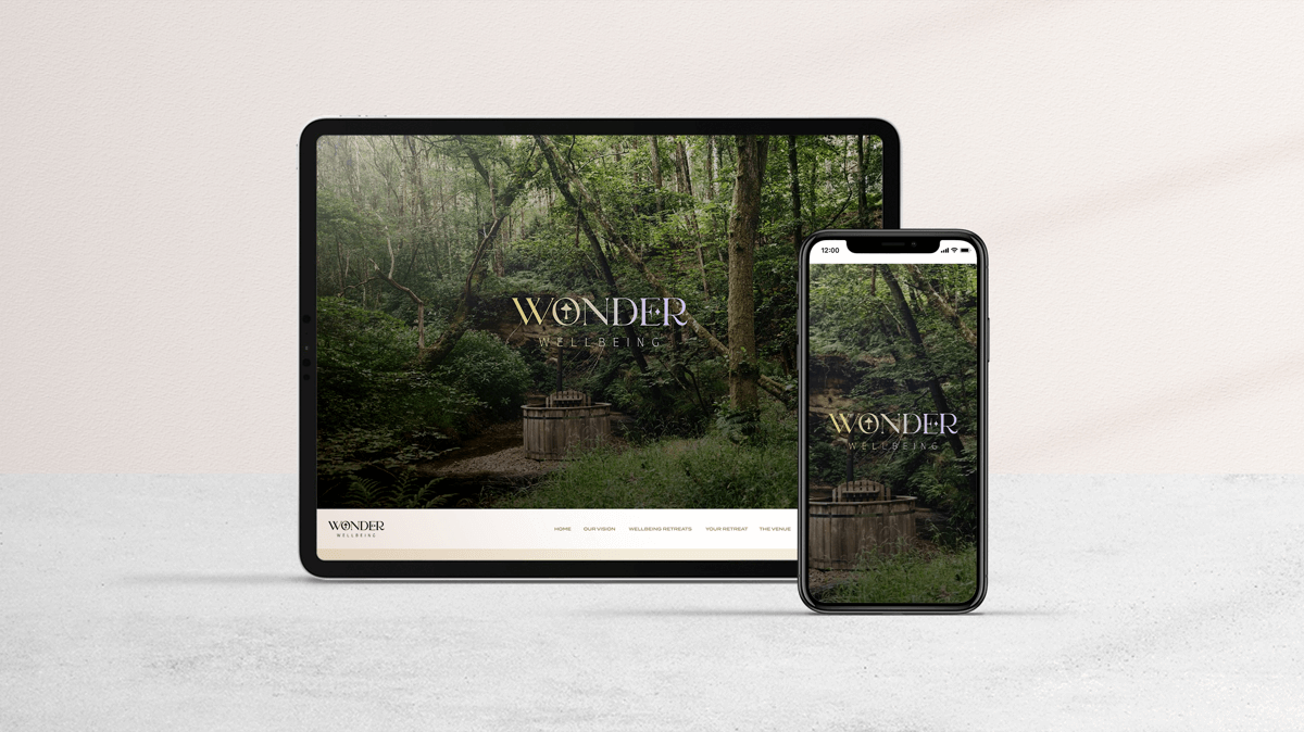 The Wonder Wellbeing website displayed on a mobile and an iPad