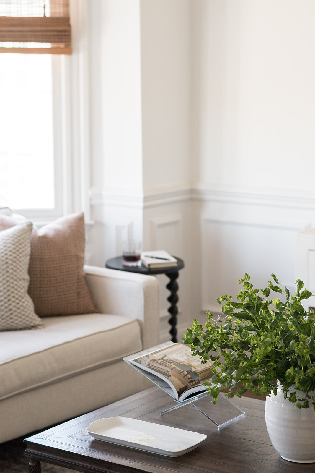 melinda chesson interiors boston living room with open book on coffee table