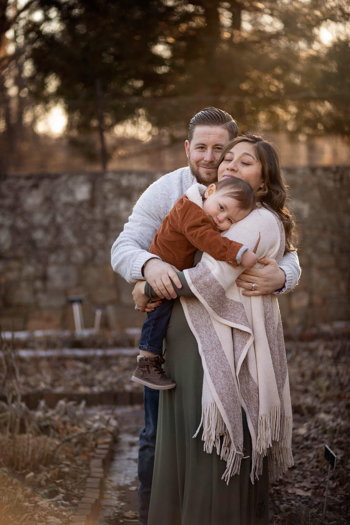 NJ Maternity photographer captures expecting family hugging