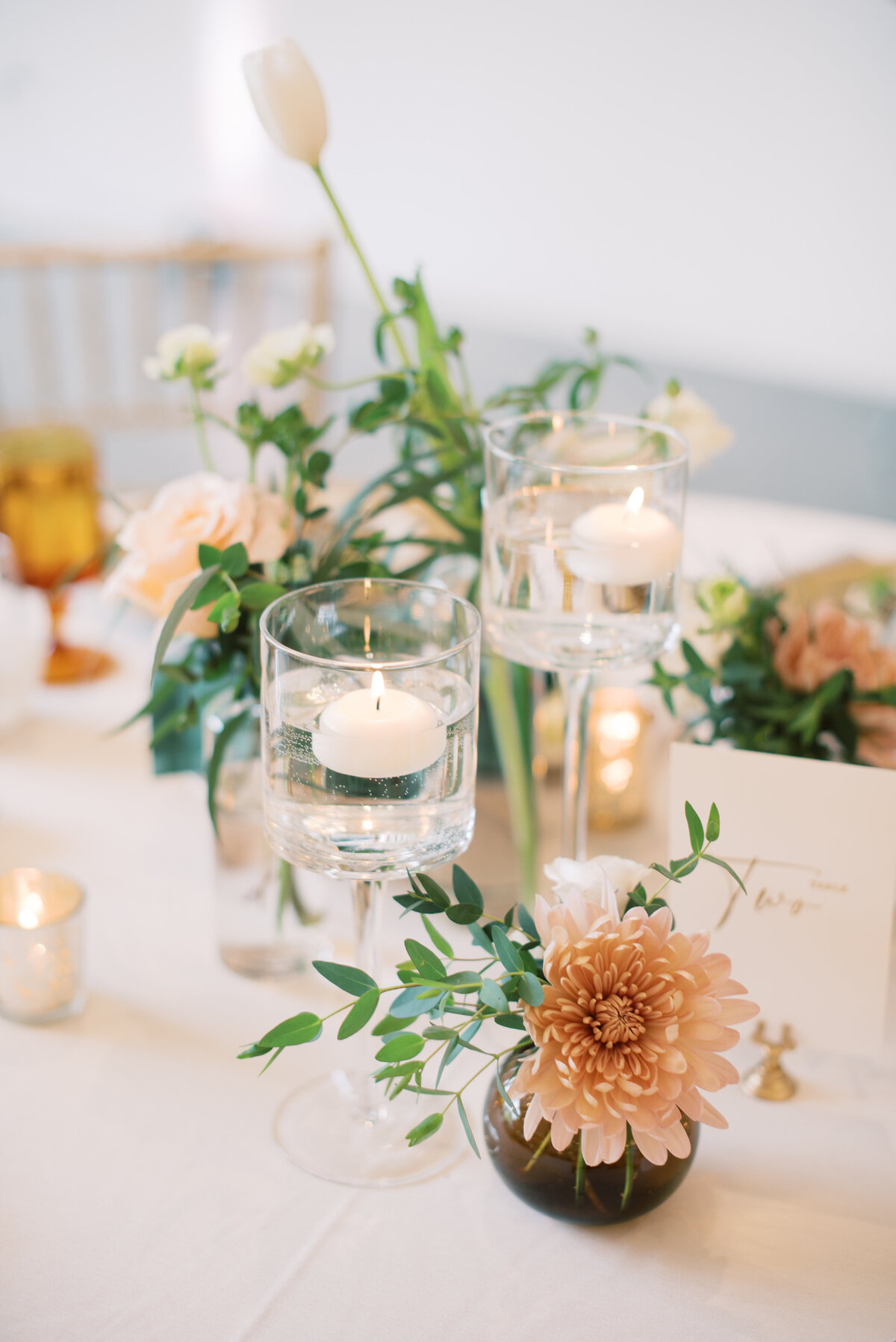 table setting with florals and candles