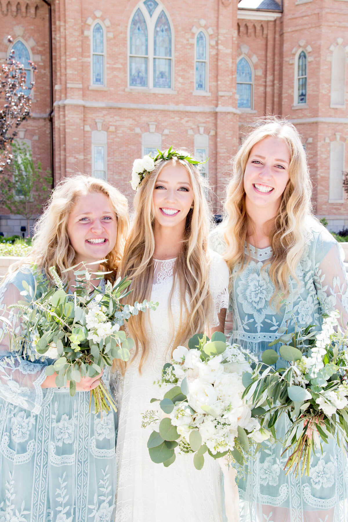 three blonde woman smiling