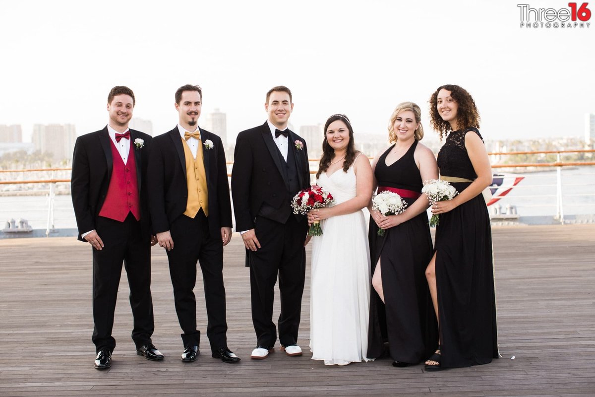 Bride and Groom pose with their wedding party