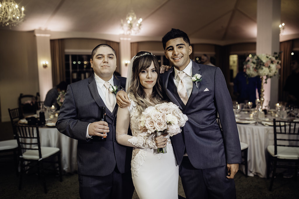 Wedding Photograph Of Bride With Two Groomsmen Los Angeles