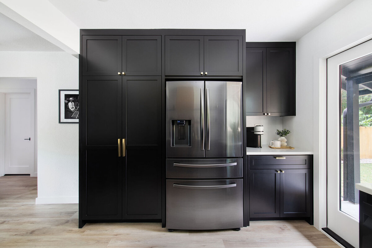 modern chic posh kitchen black and brass remodel rental design 12