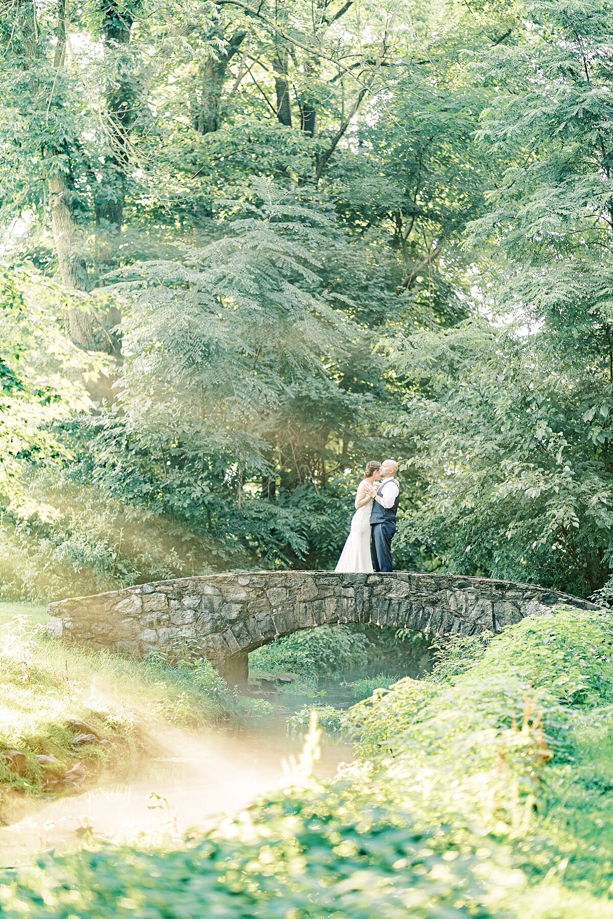 Cameron Estates Inn light rays on stone bridge